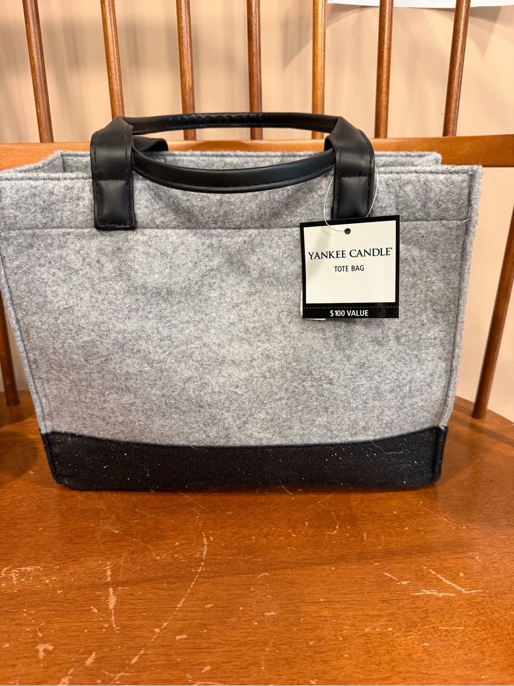 Yankee Candle Empty tote bag Gray Felt with Black glitter bottom.